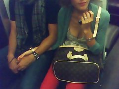 downblouse braless in Paris underground railway